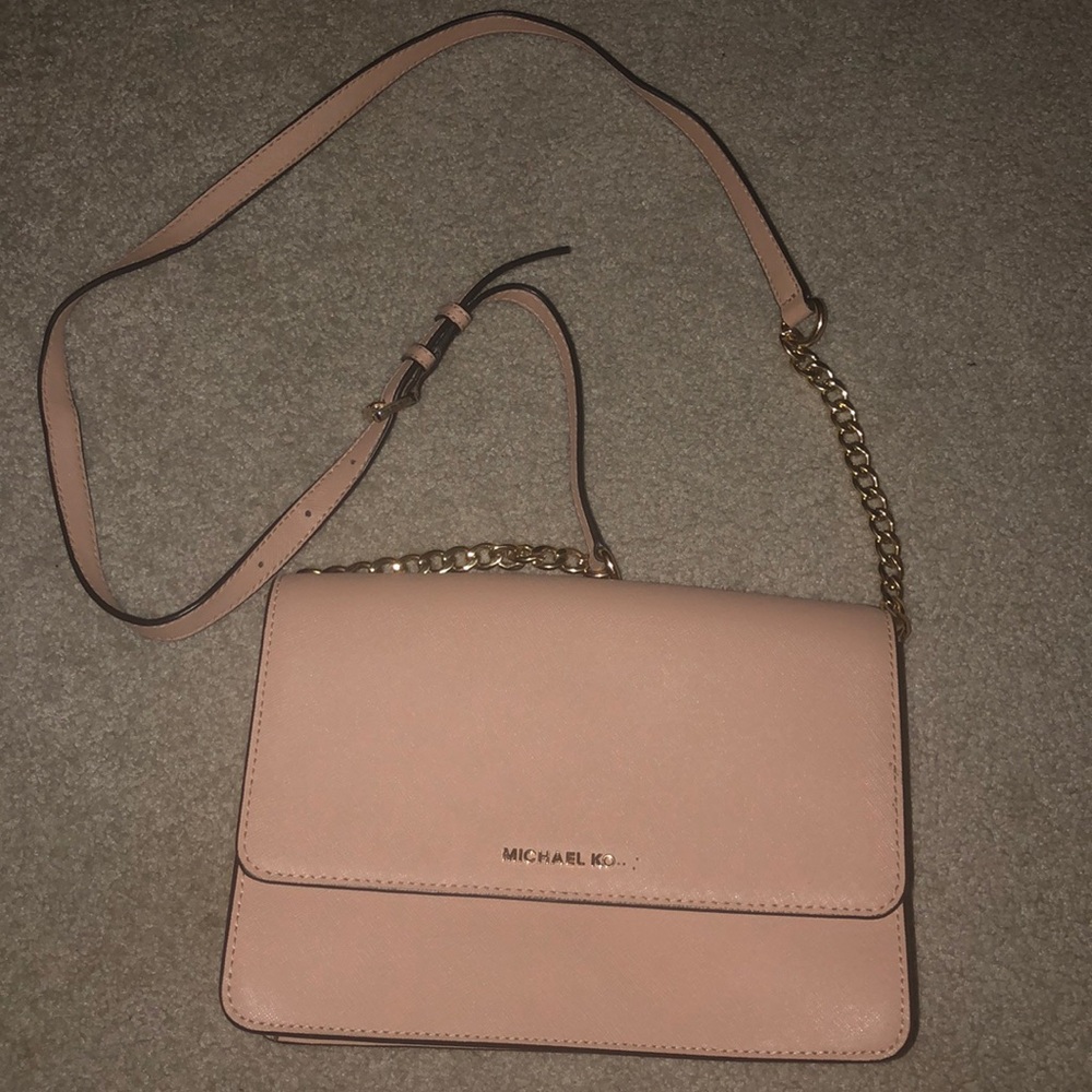 Michael kors crossbody flawed